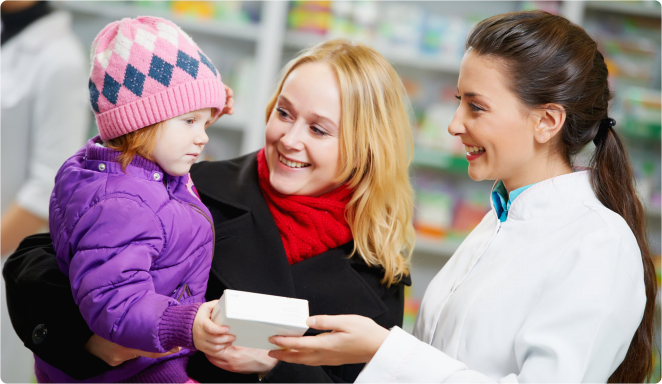 doctor giving a box to the child