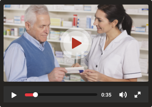 doctor giving medicine to the elderly man